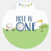 1つの最初の誕生日のカップケーキの穴が青でトッパー