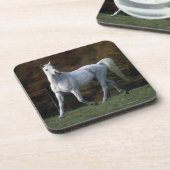 1つを走っているアラビアの馬 コースター (左側)