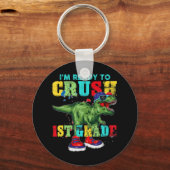 1年生T型恐竜を押し戻す準備ができている キーホルダー (正面)