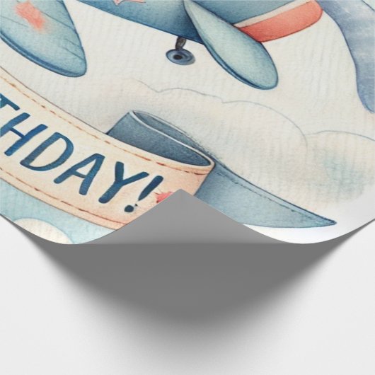 1歳の誕生日を迎えた飛行機の男の子の水色アップ遠くに ラッピングペーパー (角)