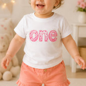 1歳の誕生日ベビーTシャツ ピンクの模様 ベビーTシャツ