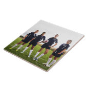 10代のな女の子のサッカーの選手のグループのportait タイル (側面)