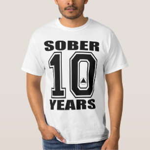 10年を黒くします白、オウムのロゴの起源で…落ち着かせて下さい Tシャツ