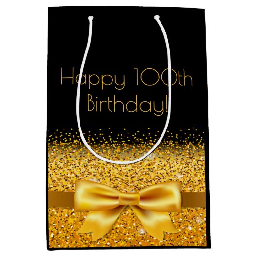 100歳の誕生日ブラック金ゴールドの弓きらめき ミディアムペーパーバッグ (正面)