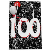 100誕生日風船オン黒グリッター ミディアムペーパーバッグ (正面)