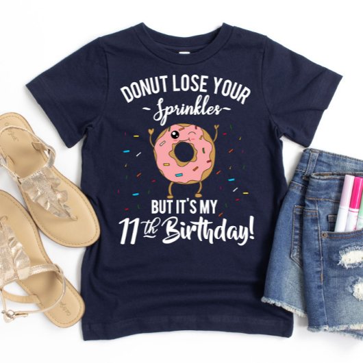 11歳の誕生日を祝う面白いドーナツのデザイン Tシャツ