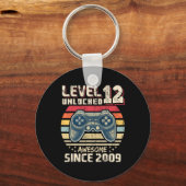 12 Unlocked 素晴らし 2009ビデオゲーム12誕生日 キーホルダー (正面)