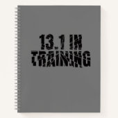 13.1トレーニング中ハーフマラソンランナー割れたガラス ノートブック (正面)