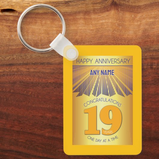 19年間の節酒記念 | ゴールデンレイ12ステップ キーホルダー (正面)