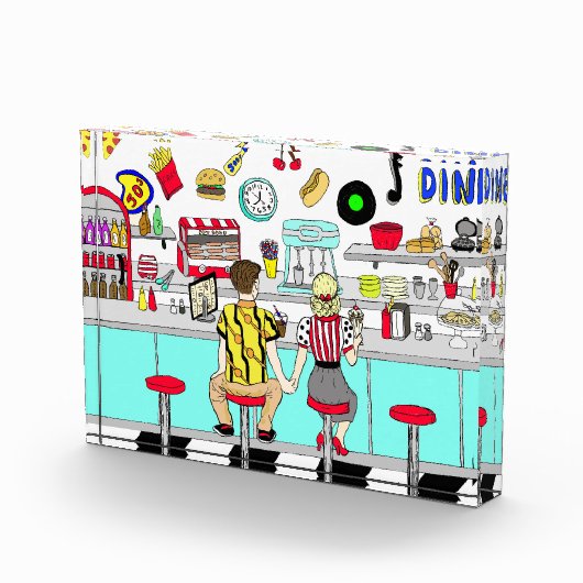 1950年代のカップルがダイナーで手を握り フォトブロック (右)