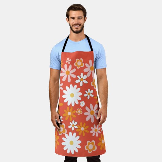 1960年代のレトロオレンジ色の花パワーキッチンエプロン エプロン (着用した状態)