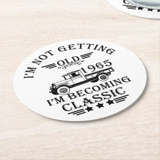 1965生まれ年のヴィンテージ誕生日ギフト ラウンドペーパーコースター (アングル)