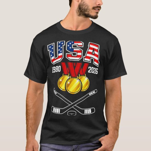 1982年~2026年 アイスホッケー ヴィンテージ USA クロススティック Tシャツ (正面)