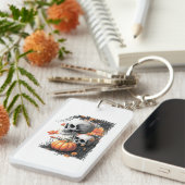 2つのスカルと花の間のカボチャ。 キーホルダー (正面右)