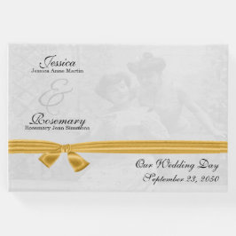 2つのヴィンテージに金ゴールドリボンの写真名が付いている ゲストブック