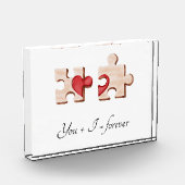 2つの一致するパズルピースと赤いハート フォトブロック (左)