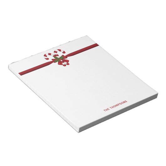 2つの赤と白フェスティバルキャンディーキャンと文字 ノートパッド (アングル)