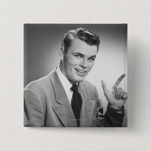 2つを指している人 缶バッジ (正面)