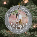2フォト初めてのクリスマス婚約したグレイフェイクウッド セラミックオーナメント<br><div class="desc">2の祝写真とあなたの婚約の楽しい1番目の休日のカスタム初めてのクリスマスの"私たちの婚約したは灰色の木のセラミックフェイクオーナメント。このテンプレート上のすべての用語と画像はシンプル、パーソナライズする違うために前面と背面で同じまたは可能である。(IMAGE & 文字デザイン TIPS: 1)文言の位置を調整するには、最初または最後に宇宙を追加する。2)写真を正確に中央に配置するには、Zazzleのウェブサイトにアップロードする前に正方形の形にトリミングする。 アイディアとして、スクリプトタイポグラフィ読は「一緒に」また結婚したは「一緒に」 デザインスタイリッシュは灰色と白の素朴な木フェイク、手書きスタイルの書道、カップルの名前と年と2つの写真の選択のを備えている。このユニーク記念結婚品はクリスマスの家庭の装飾エレガントにtouchを追加する。</div>