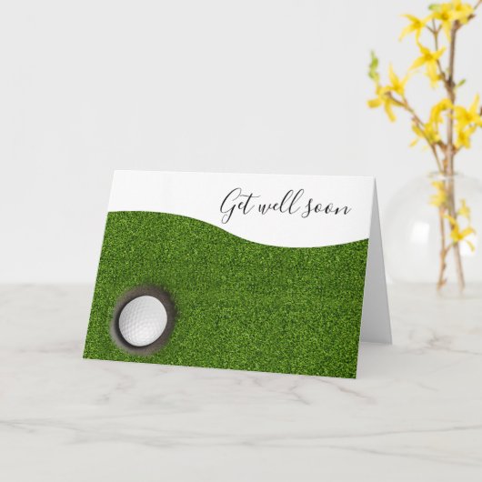 2個のゴルフボールと緑のティーで早く元気になる カード (黄色い花)