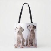 2匹の小さい白黒Dalmatian子犬 トートバッグ (正面)