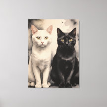 2匹の猫が一緒に座っている