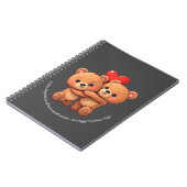 2本の漫画は抱きしめている。 ノートブック (左側)