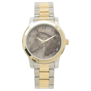 2頭のベビーの馬の黒の子馬のクリの子馬のポートレート 腕時計