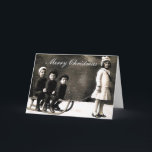 20年代のクリスマスの挨拶状 シーズンカード<br><div class="desc">20年代の間にクリスマスの写真のために提起している子供を示す挨拶状</div>