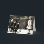 20年代のクリスマスの挨拶状 シーズンカード<br><div class="desc">20年代の間にクリスマスの写真のために提起している子供を示す挨拶状</div>