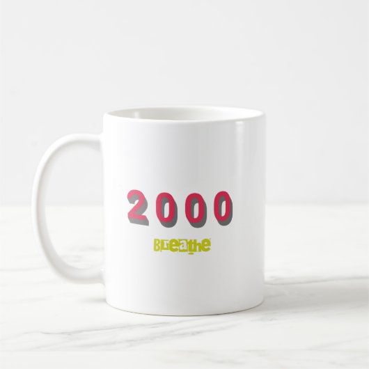 2000年の年間トップソング コーヒーマグカップ (左)