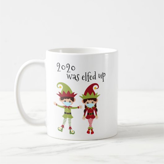 2020年のクリスマスは可愛い小妖精や小人 コーヒーマグカップ (左)