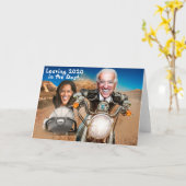 2021年新年おめでとう、バイデン氏&ハリスバイクもしくは自転車に乗る人 カード (黄色い花)