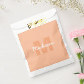 2024年の桃の色とカスタムモノグラム名 フェイバーバッグ (封をした状態)