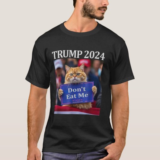 2024年の食べトランプに猫を呼んでくれ Tシャツ (正面)
