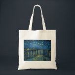 25セントヴァン・ゴグによるローネ上空の星空の夜 トートバッグ<br><div class="desc">Starry Night、一般的にStarry Nightとして知られるローヌ越しに、夜のヴィンセント・ヴァン・ゴッホのアルズの絵画の一つである。ラ色彩の鮮やかンヌ川の土手に乗って、当時バン・ゴッホが借りていたラマルティン広場の黄色い家から徒歩1~2分だった。夜の空と夜の光の効果は、ゴッホの有名な絵画の一部の主題となった。夜のカフェテラス色彩の鮮やかト(同じ月の前)、1889年6月のサンレミーのキャンバスなど。</div>