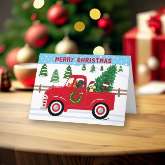 3つのラブラドールレッドトラッククリスマス シーズンカード