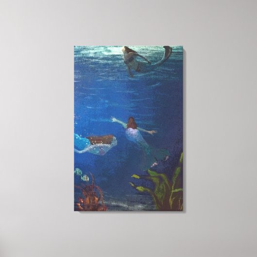 3人の人魚が水中で泳いでいる キャンバスプリント (正面)