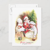 3人の女の子が新しい服を試すヴィンテージクリスマス シーズンポストカード (正面/裏面)