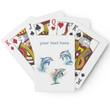 3匹のイルカが水から飛び出す