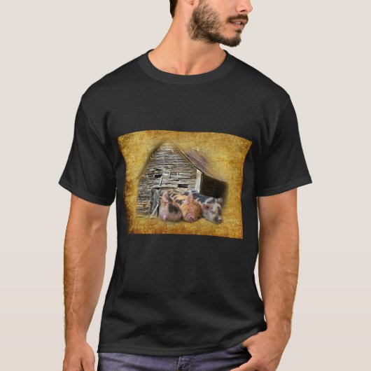 3匹の小さな豚が納屋で雪素朴を眺めている Tシャツ (正面)