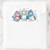 3匹の猫が雪の中でクリスマスキャロルを歌う 楕円形シール (バッグ)