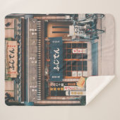 3台の自転車を前に置く建物 シェルパブランケット (正面(横))