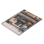 3台の自転車を前に置く建物 ノートブック (左側)