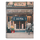 3台の自転車を前に置く建物 ノートブック (正面)