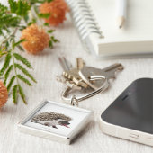 4つま先で触られたハリネズミ- Atelerixのalbiventris キーホルダー (側面)