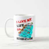 50メートル一度に コーヒーマグカップ (左)