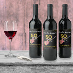 50 Rocks Pink Black金ゴールド50th Birthday Party ワインラベル<br><div class="desc">彼女祝は、このピンクのブラックと金ゴールドのグリッター50クールロック50歳の誕生日パーティワインラベルでロックとロールのスタイルで50歳の曲げパーソナライズされたを回す。あなたのロックスターの妻、ガールフレンド、パートナーや友人のマイルストーンの誕生日のためかどうかクール、このカラフルエレキギターはピンクピックガードイラストレーション、音楽ノートと金ゴールドタイポグラフィスクリプトと真のロックのロールスタイルで彼ら祝とのエレキギター。簡単を使用してテンプレートを追加できるように誕生日セレブ名、理想的なピンクのブラックと金ゴールドグリッターテーマとライブ音楽イベント。ロックンロール50th誕生日パーティー50ロックスコレクションをチェックして一致するパーティー供給。ミュージシャン、ギタープレーヤー、ライブ音楽愛好家がこのトレンディーミュージカルテーマを愛する。オリジナルのアートワークby artist Catherine Sweetman</div>