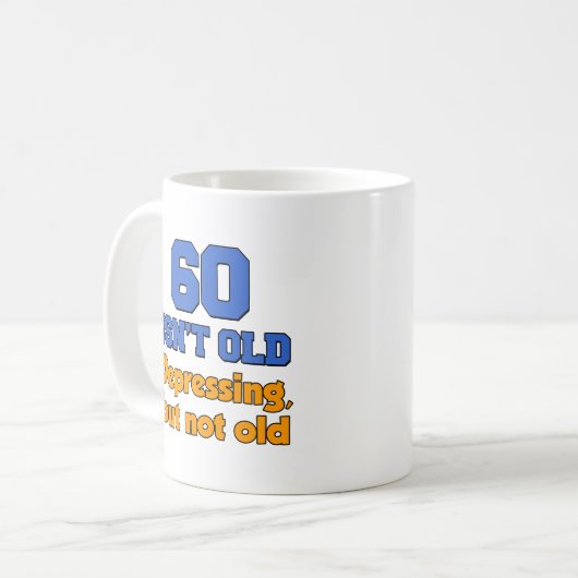 60歳は気がめくばかりのマグの時代じゃない コーヒーマグカップ (正面左)