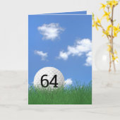 64歳の誕生日、芝生の中のゴルフボール カード (黄色い花)